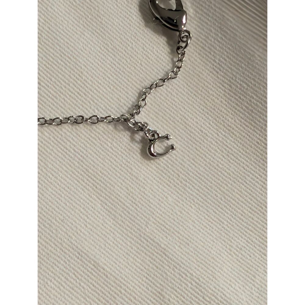 Coach Women's Small Silver Elegant Designer Heart Charm Bracelet NWT - Picture 2 of 6